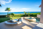 Seaside pool and terraces of the Akumal beachfront villa at Punta Sur