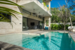 Pool and private gardens at Casa Bindi in Región 15, Tulum.
