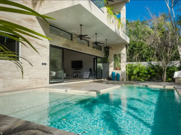 Pool and private gardens at Casa Bindi in Región 15, Tulum.