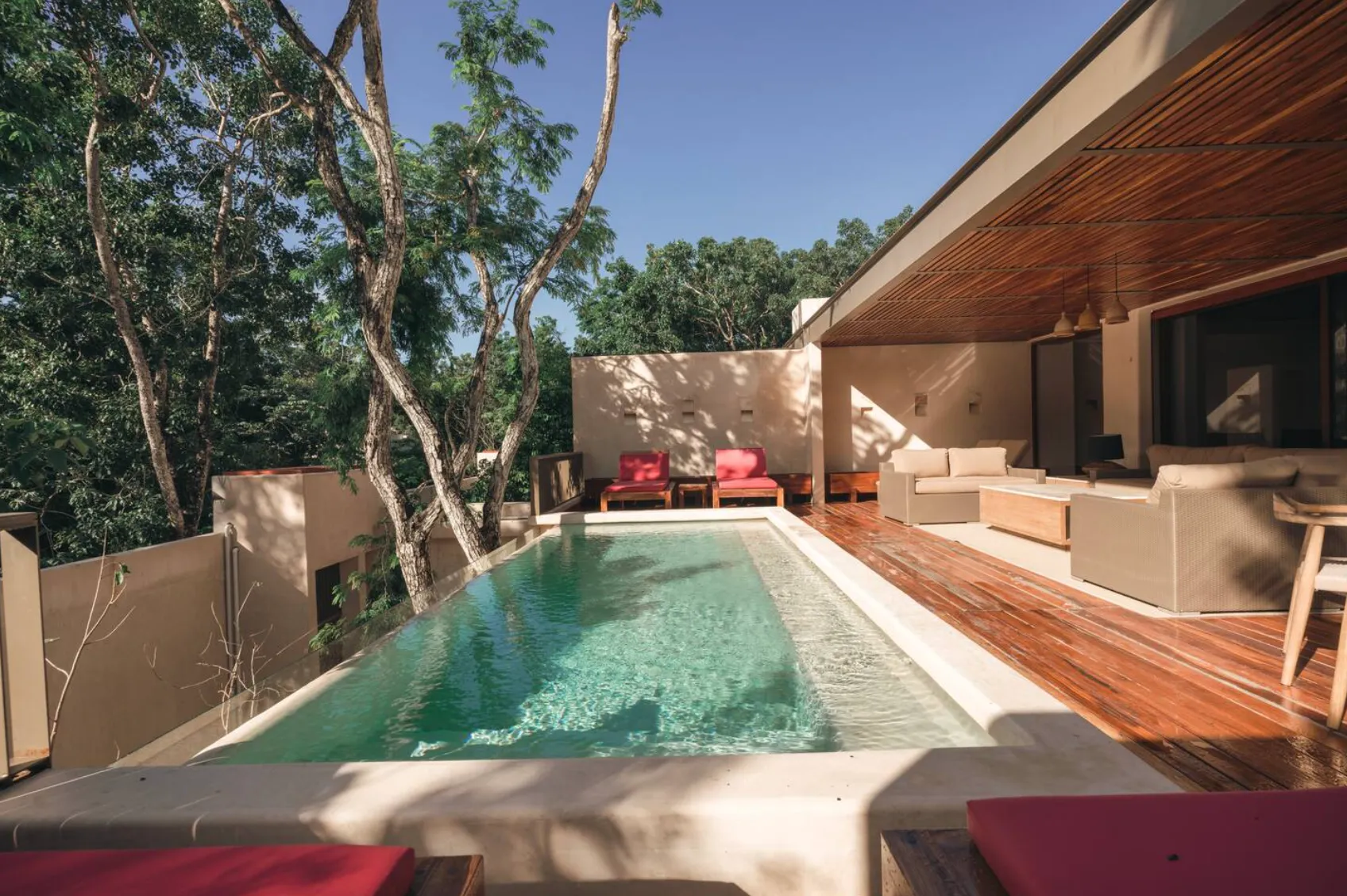 Casa Rossa: 4-Bedroom Villa by Guillermo Alcocer in Holistika, Tulum