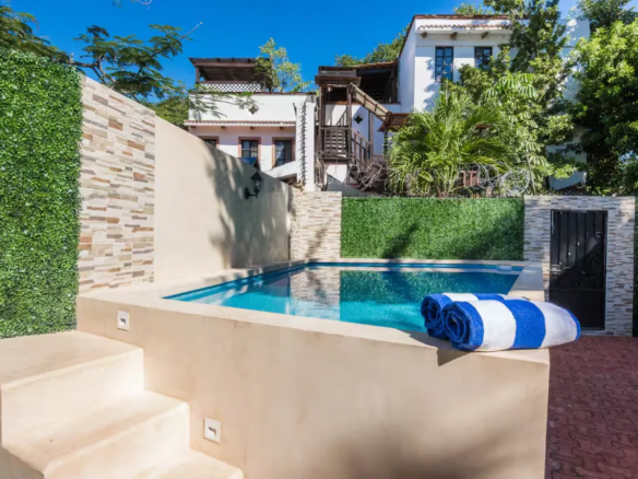 Private pool and patio at a three-bedroom house in downtown Playa del Carmen.