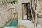 Private garden terrace off the living space at Casa Mirra in La Veleta, Tulum