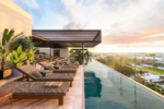 Rooftop solarium at Costa Celeste with views over Centro Playa del Carmen