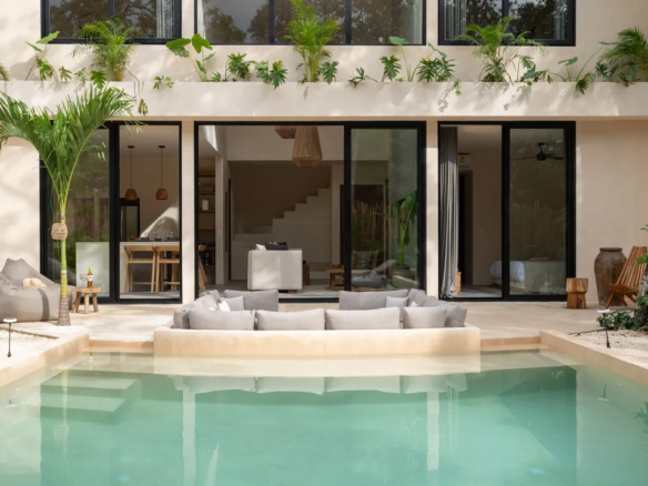 Private pool and chukum-finished terrace at DUNA villa in Tulum.