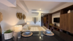 Interior of a delivered studio at Studio 34 Playa del Carmen showing kitchen and living area
