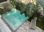 Private pool and garden of a four-bedroom villa in Ciudad Mayakoba, Playa del Carmen.