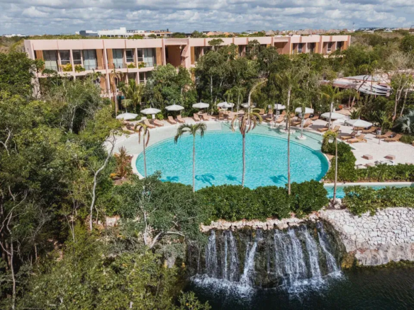 Pool and cascades at Aflora in Aldea Zamá, Tulum.