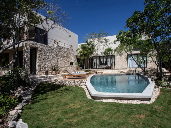 One of two private pools and hardwood deck at Villa La Grieta, Akumal.