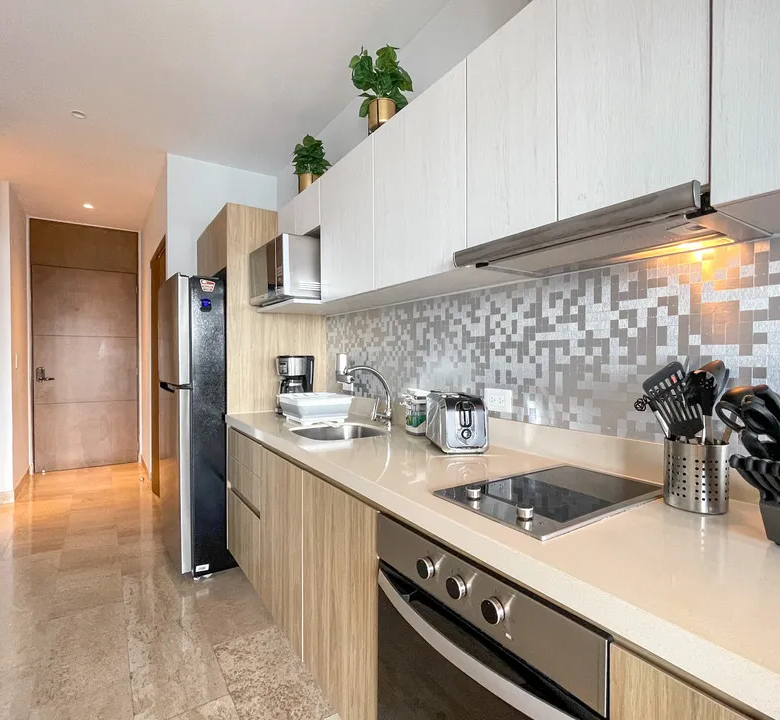 Kitchen with marble countertops at Ipana C 216, Downtown