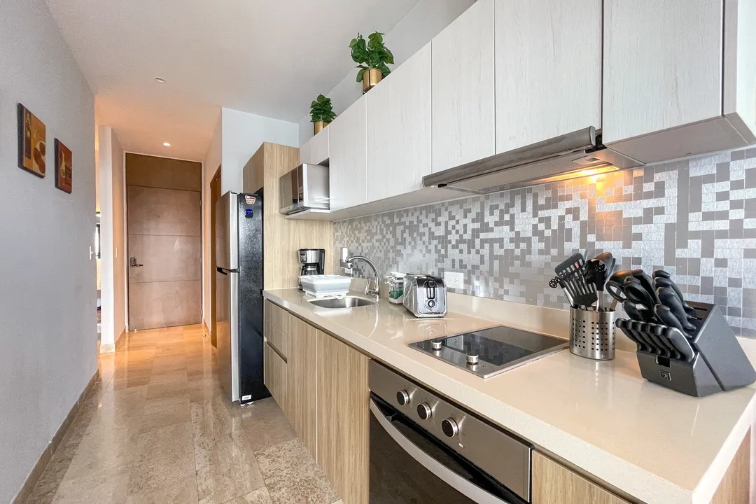 Kitchen with marble countertops at Ipana C 216, Downtown