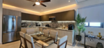 Furnished open-plan living area at PortoBlu near the beach