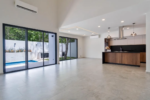 Double-height living and garden pool at the Vía Cumbres villa