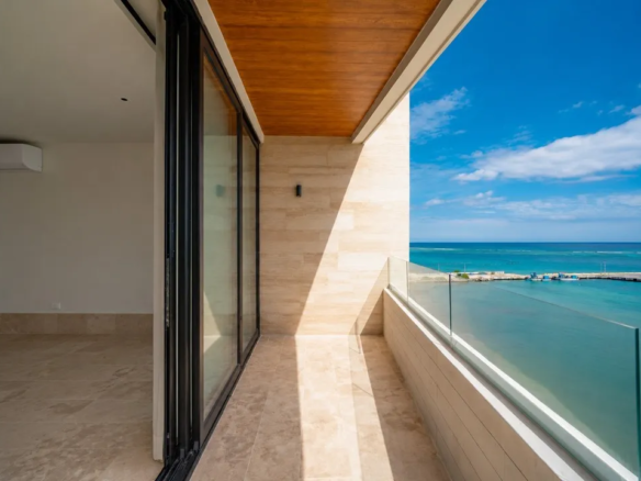 Distrito Puerto 2-bedroom beachfront condo in Puerto Morelos