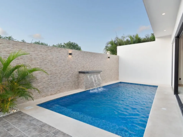 Waterfall pool and terrace at the Residencial Río villa