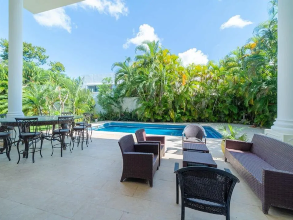 Garden pool and terrace at the Lagos del Sol villa