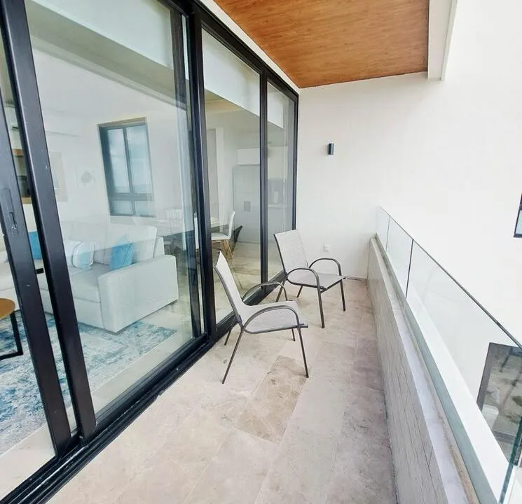 Distrito Puerto 401: 2-Bedroom Beachfront Condo in Puerto Morelos
