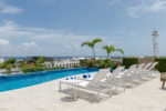 Infinity pool and sun deck at Midtown 256 Playa del Carmen