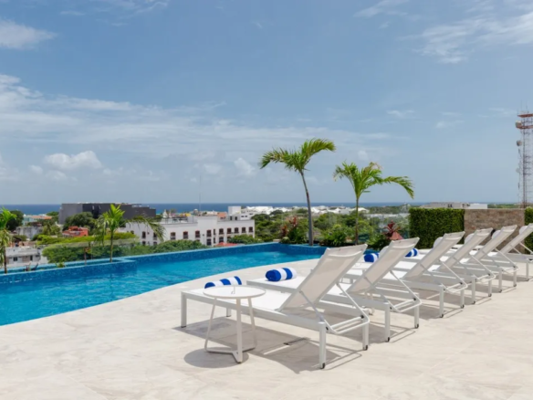 Infinity pool and sun deck at Midtown 256 Playa del Carmen