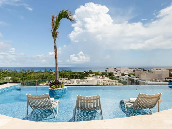 Infinity pool and sun deck at Liltown Playa del Carmen