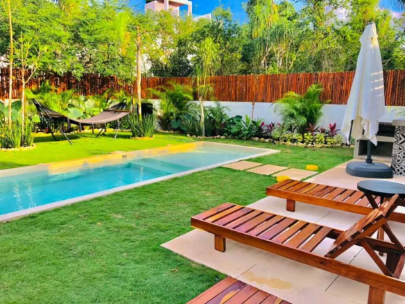 Pool and pergola terrace at Villa Caribe