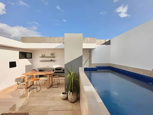 Private rooftop pool and grill at Kaan Tower D302