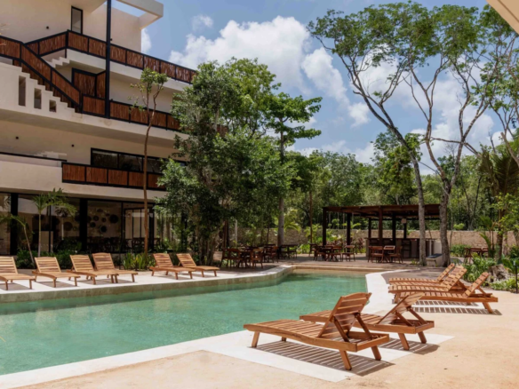 Pool and Balinese beds at Nativa Tulum