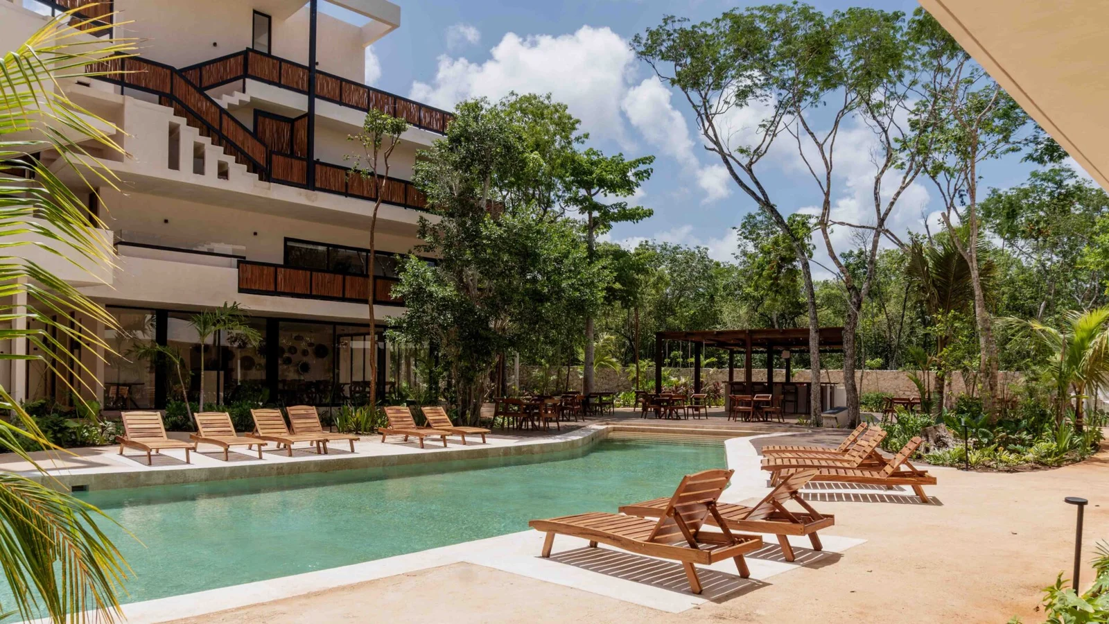 Pool and Balinese beds at Nativa Tulum