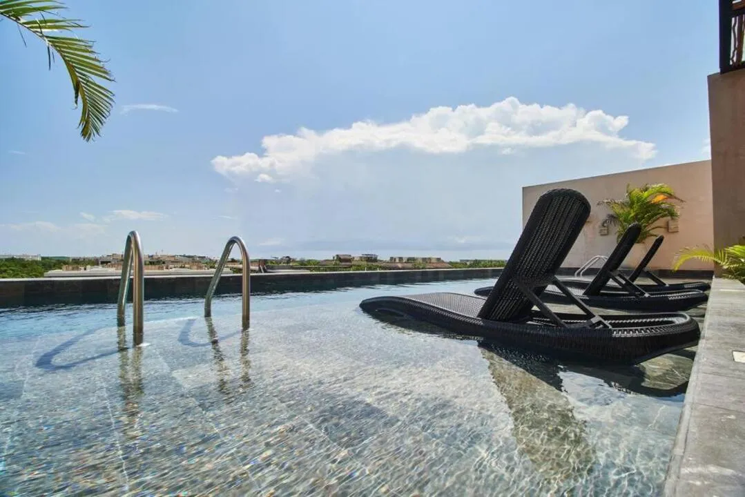 phimai-2-1-bedroom-condo-aldea-zama-tulum-pool-09 Rooftop pool at Phimai Aldea Zama