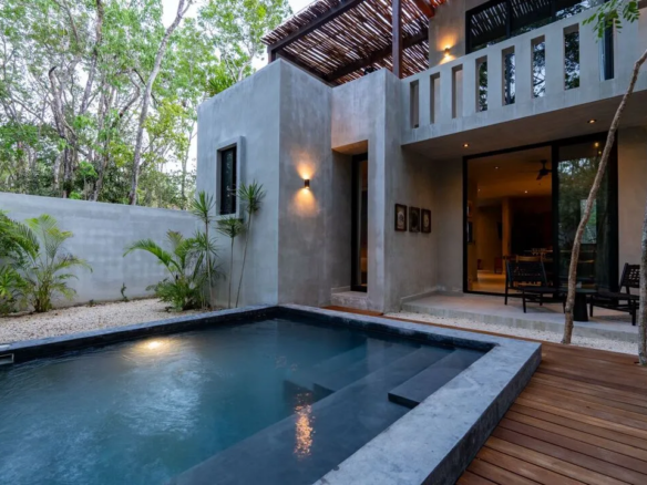 Private pool and garden at a Selva Maya villa