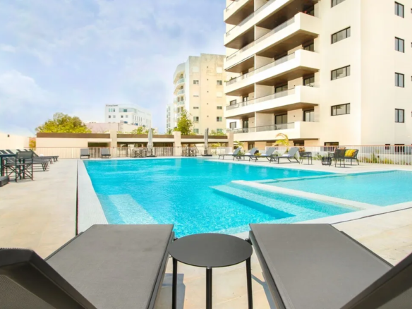 Family pool and adults-only pool at Vela Towers